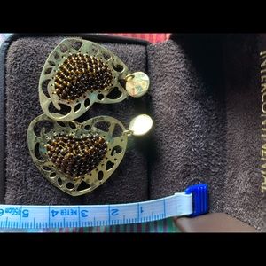 Golden dangle earrings with brown beads